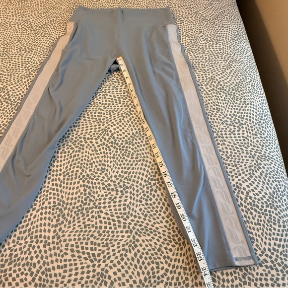 Fabletics | Blue Leggings with Signature Reflective White Side Stripe - Picture 5 of 9